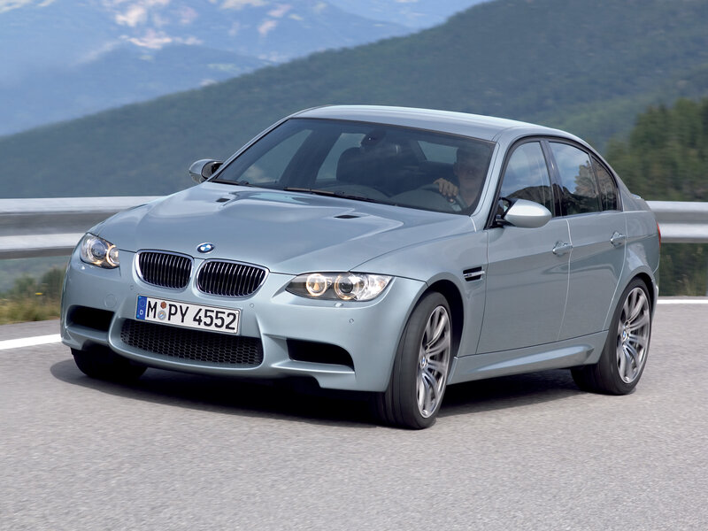 Silver BMW M3 on mountain road