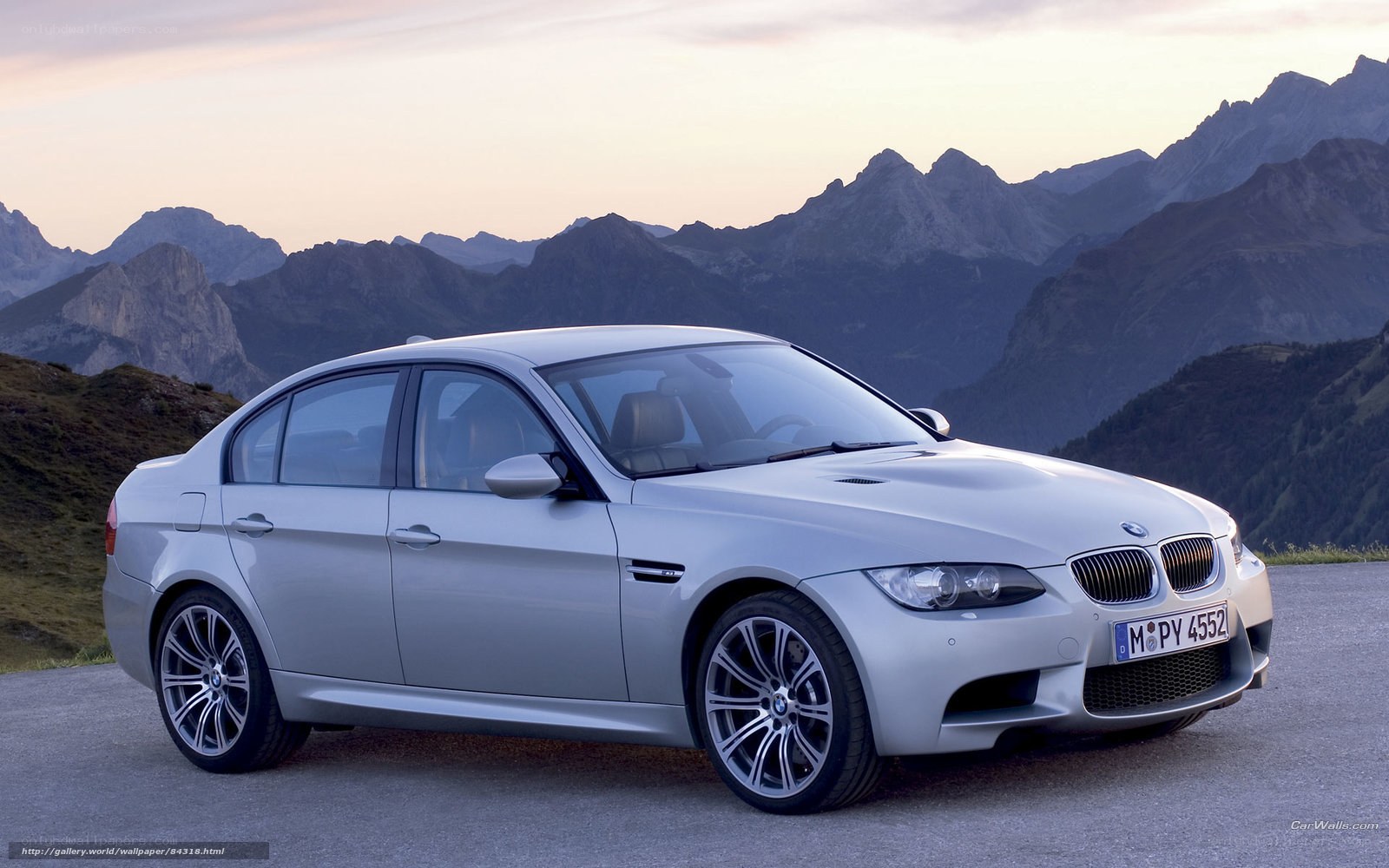 Silver BMW M3 on mountain road
