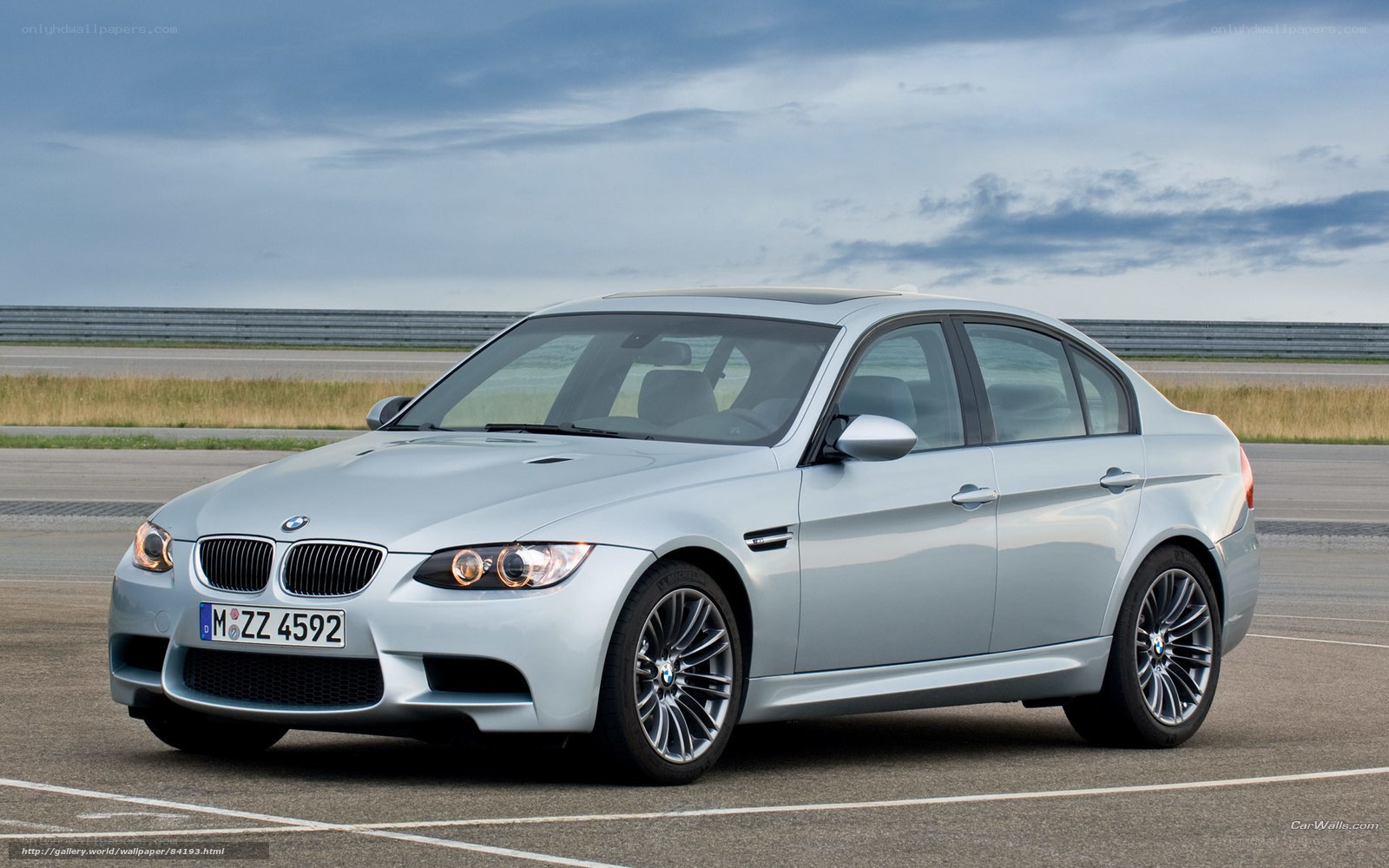 silver bmw m3 on racetrack