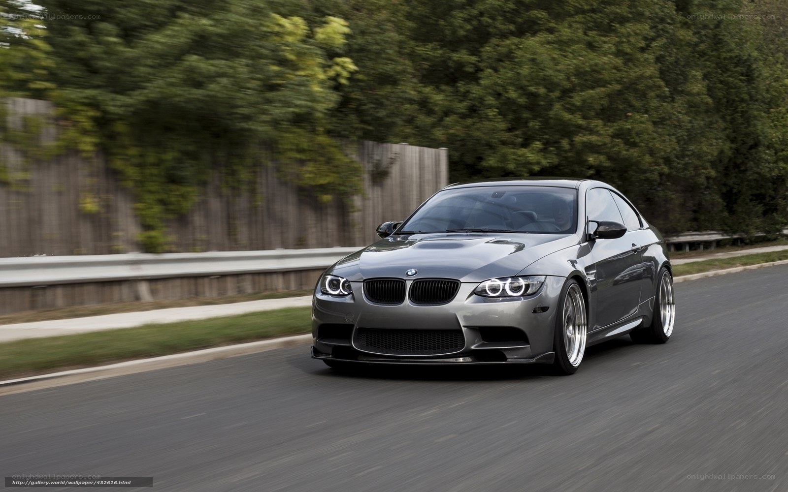 silver bmw m3 on road