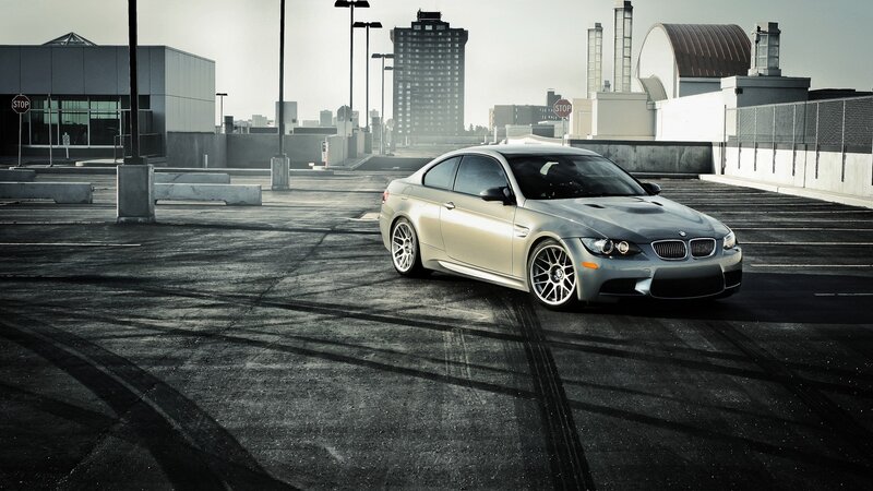 silver bmw m3 on rooftop