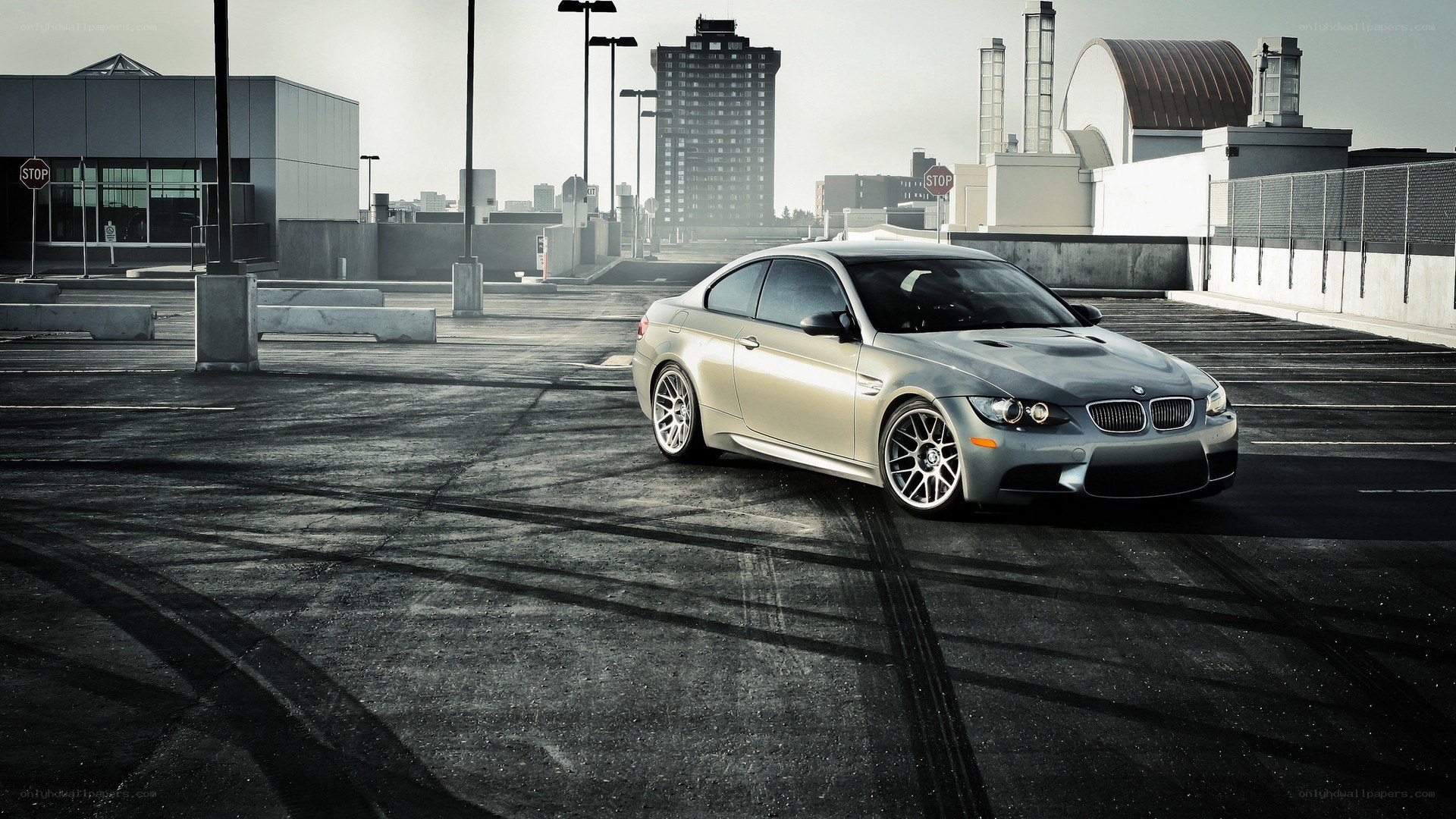 silver bmw m3 on rooftop