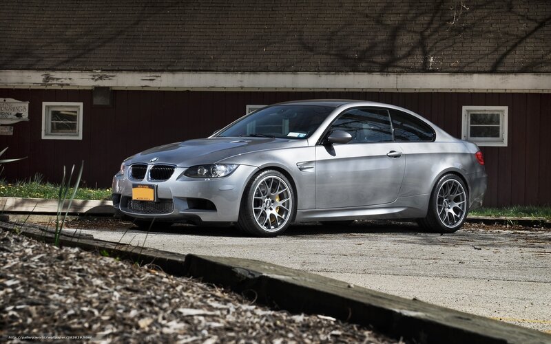 Silver BMW M3 parked outside