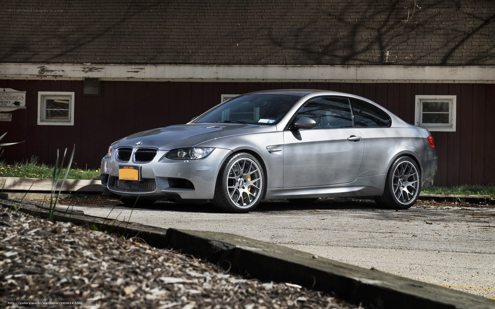 Silver BMW M3 parked outside
