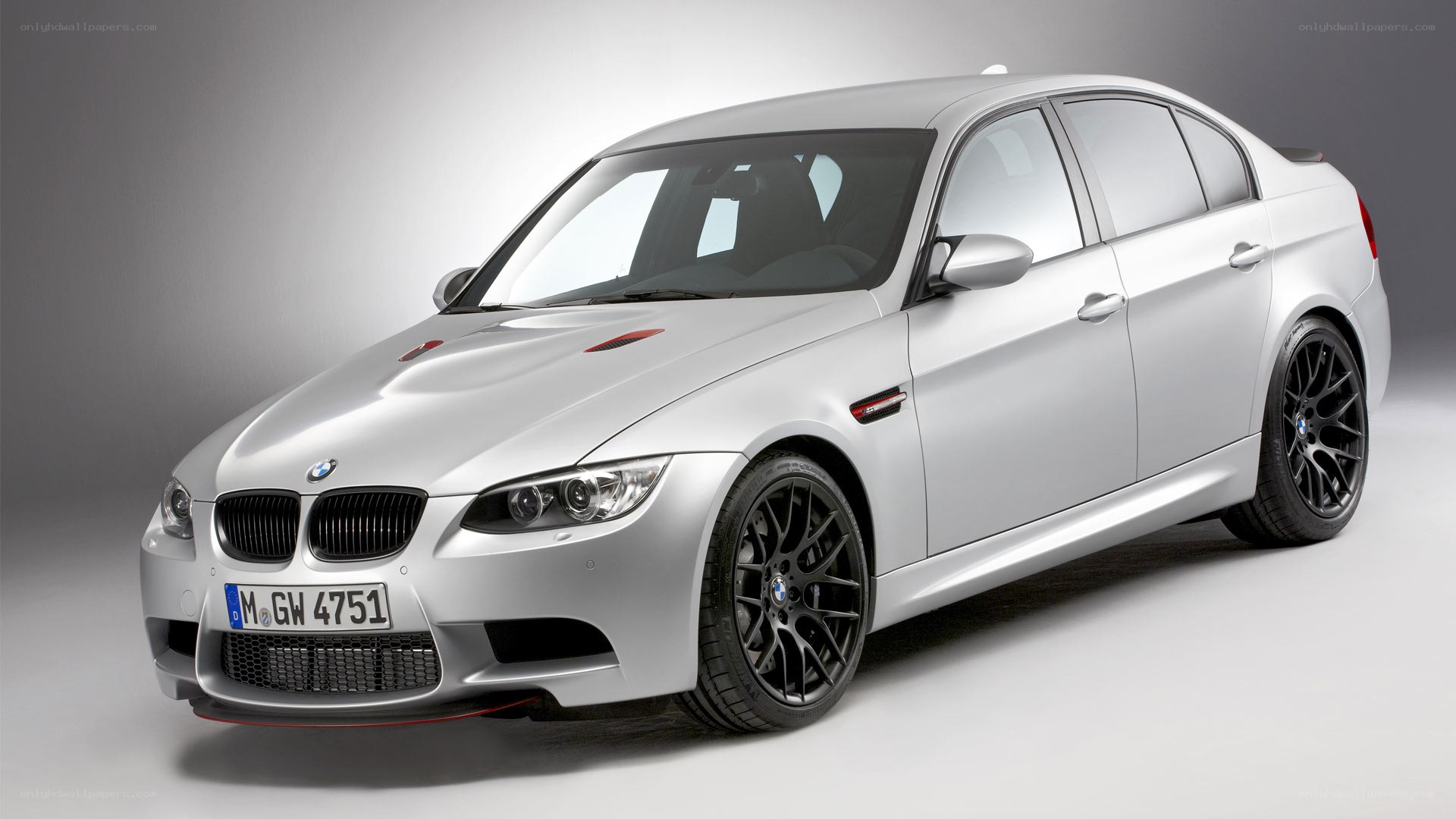 silver bmw m3 sedan