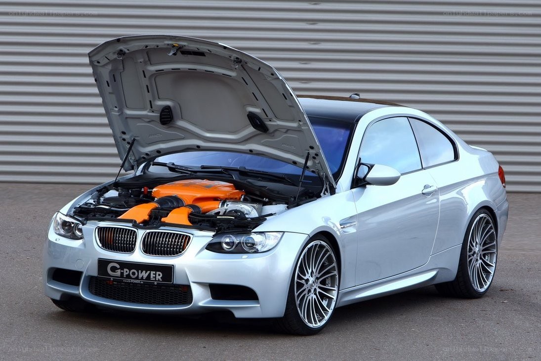 Silver BMW M3 with open hood