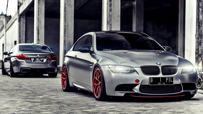 Silver BMW M3 with red wheels