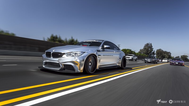 Silver BMW M4 on Highway