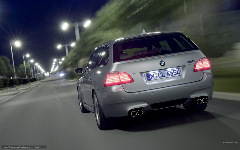 silver bmw m5 driving at night
