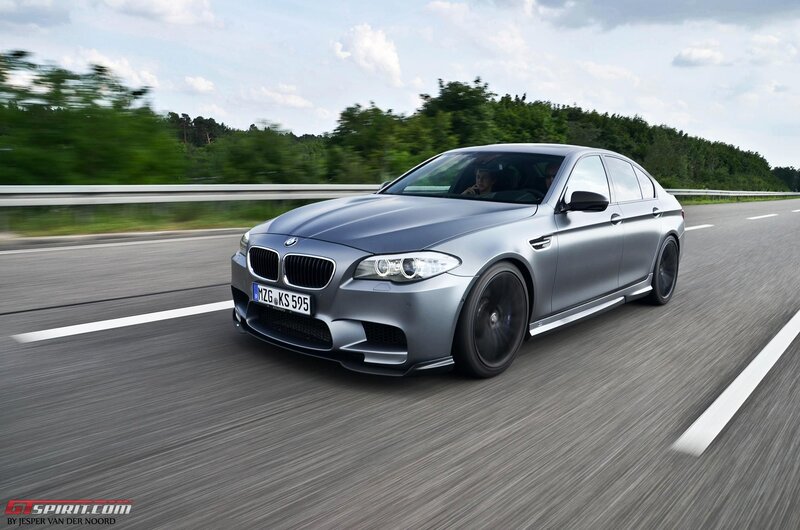 silver bmw m5 on highway