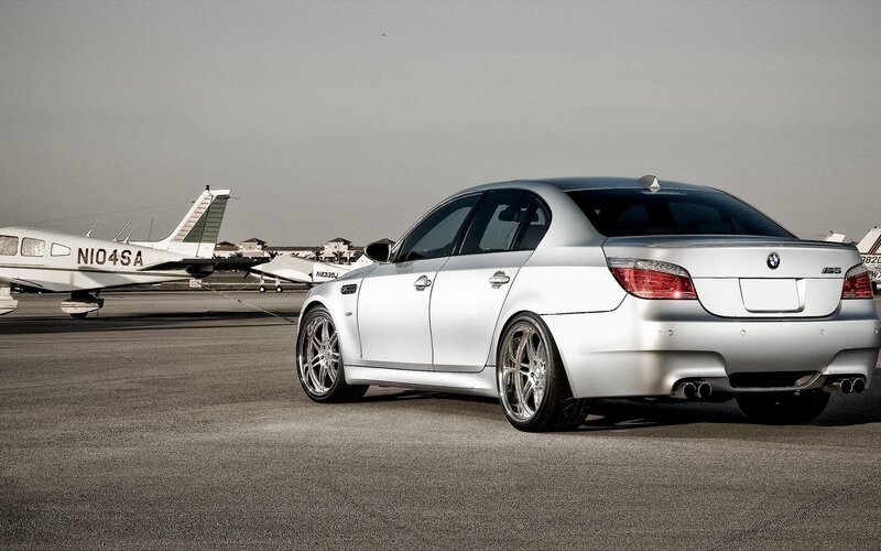 Silver BMW M5 on tarmac