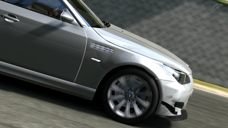 silver bmw m5 on track