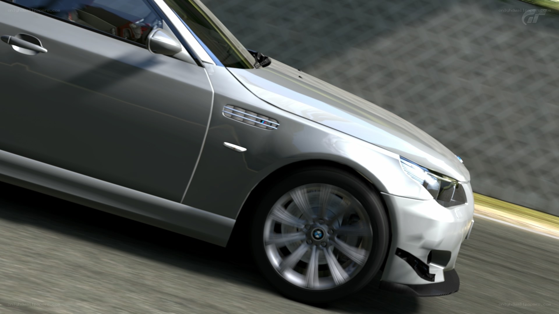 silver bmw m5 on track