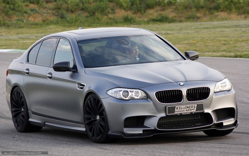 silver bmw m5 on track