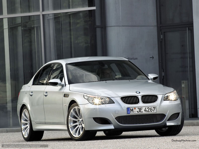 Silver BMW M5 parked outside