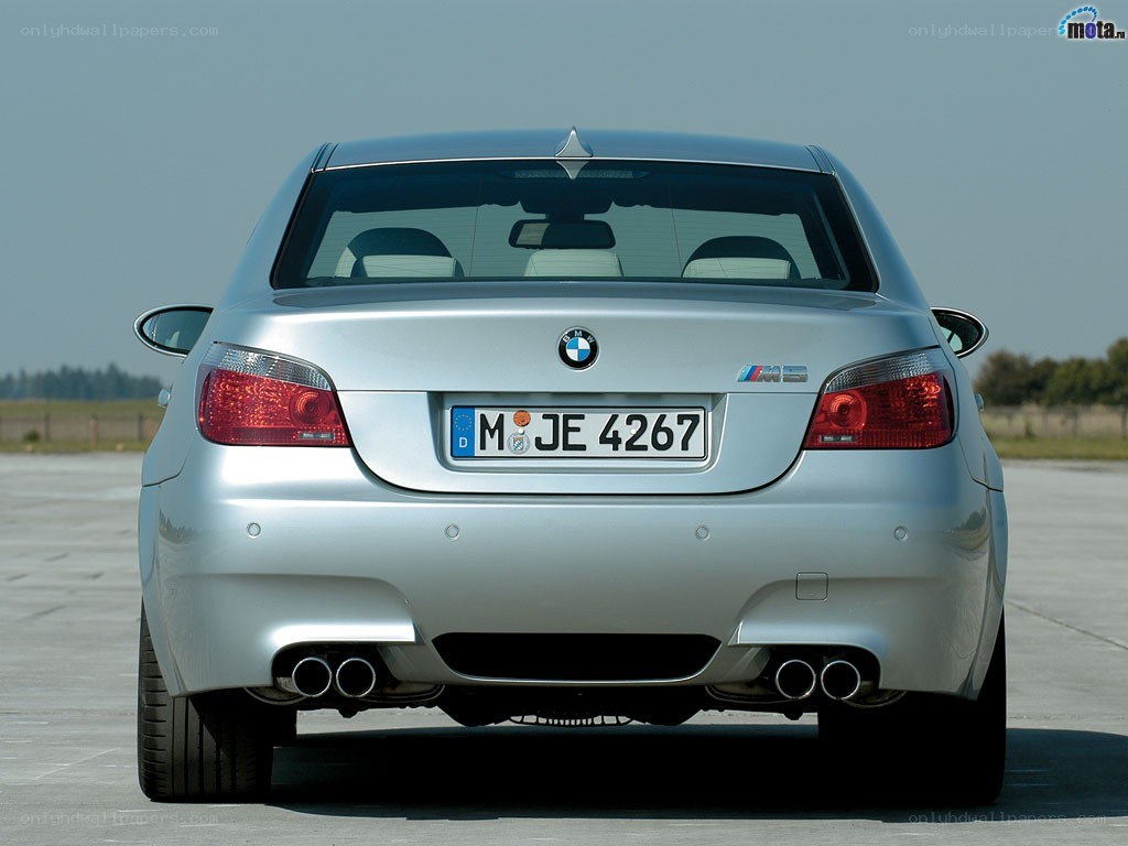 silver bmw m5 rear view