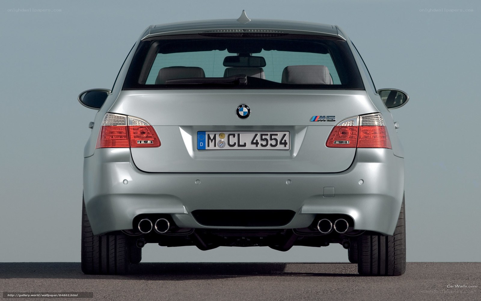 silver bmw m5 rear view