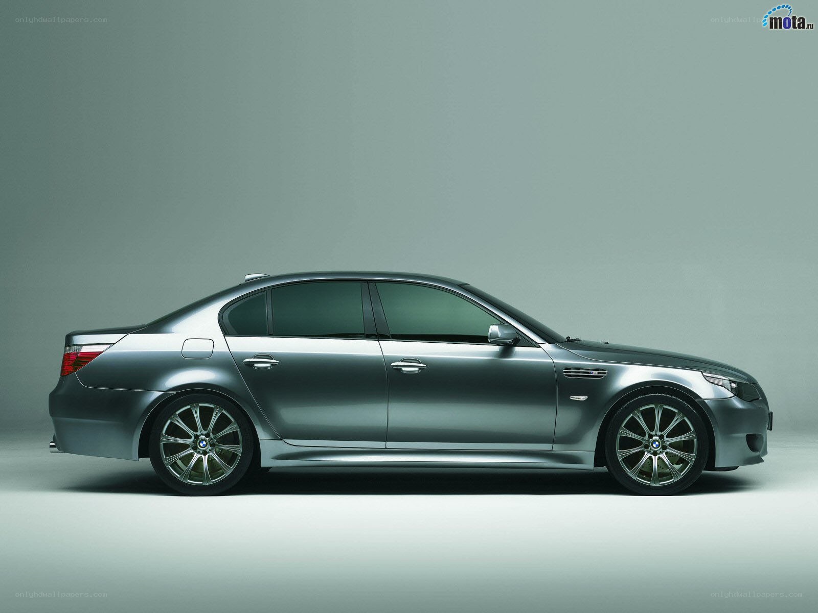 silver bmw m5 sedan