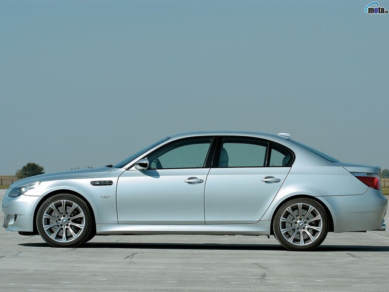 silver bmw m5 sedan
