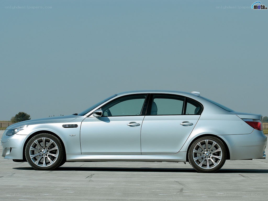 silver bmw m5 sedan