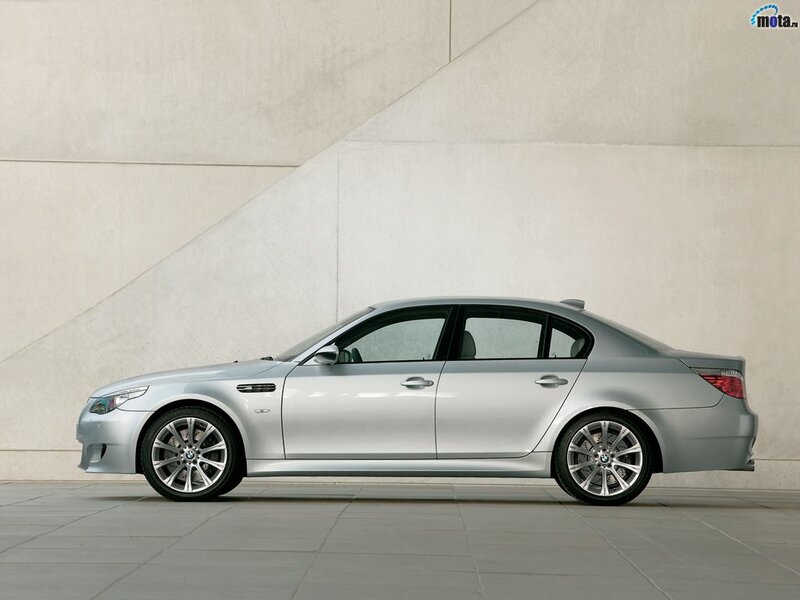 silver bmw m5 sedan