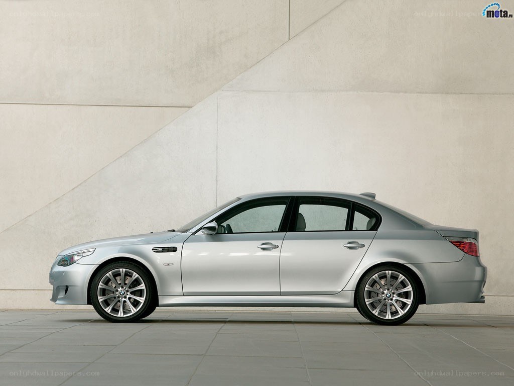 silver bmw m5 sedan