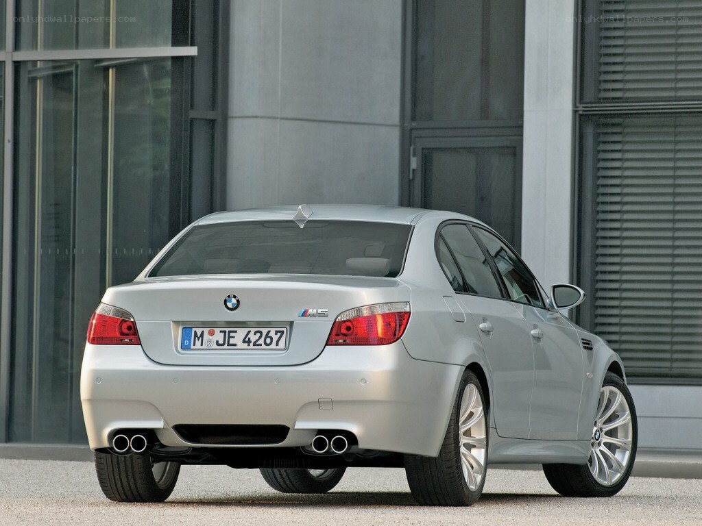 silver bmw m5 sedan