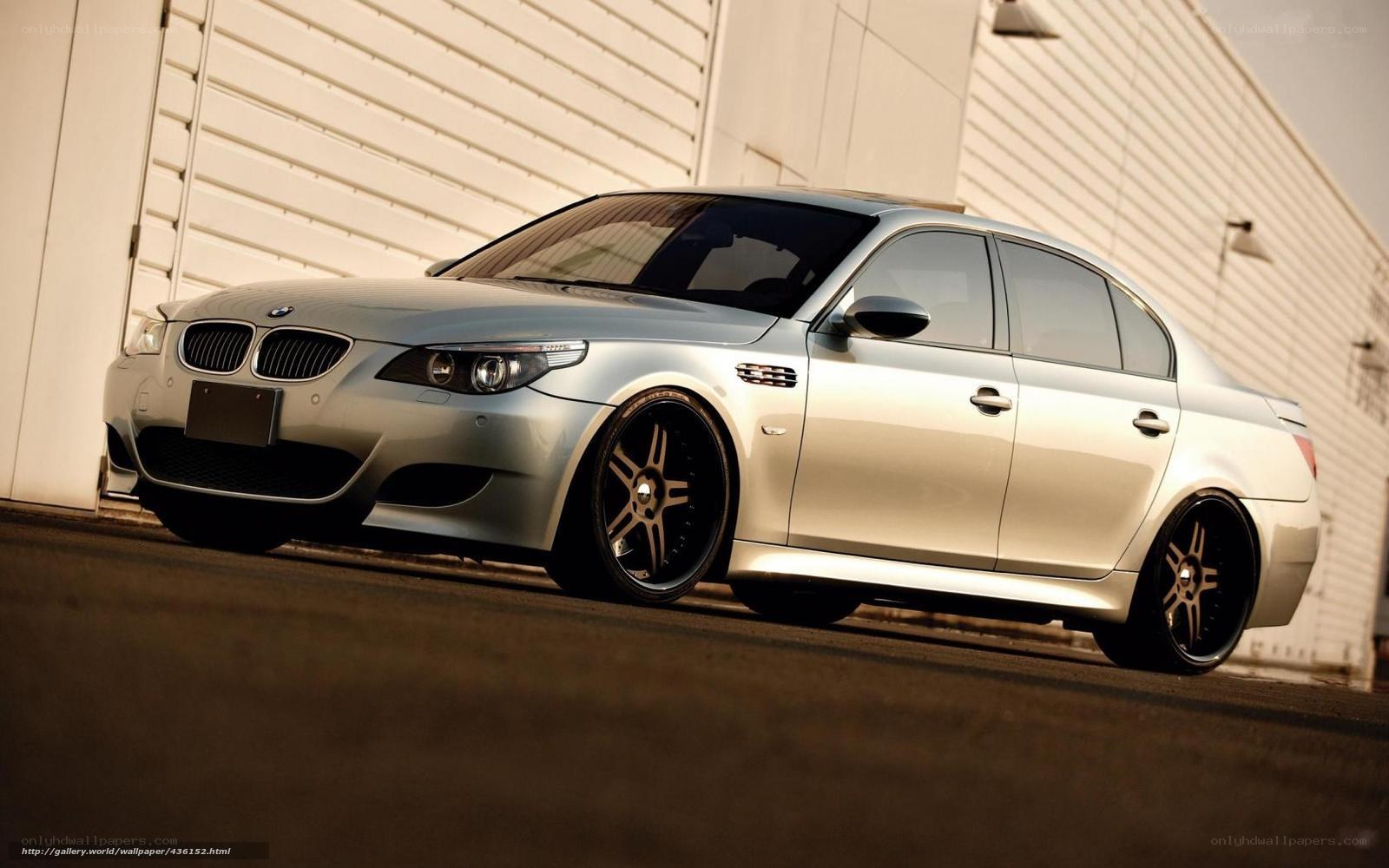 silver bmw m5 sedan
