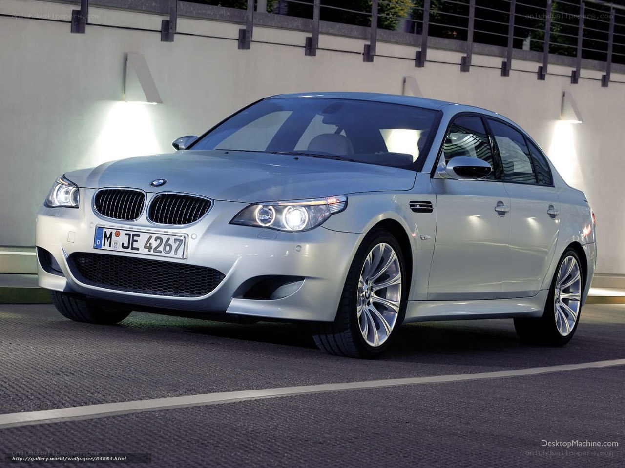 silver bmw m5 sedan