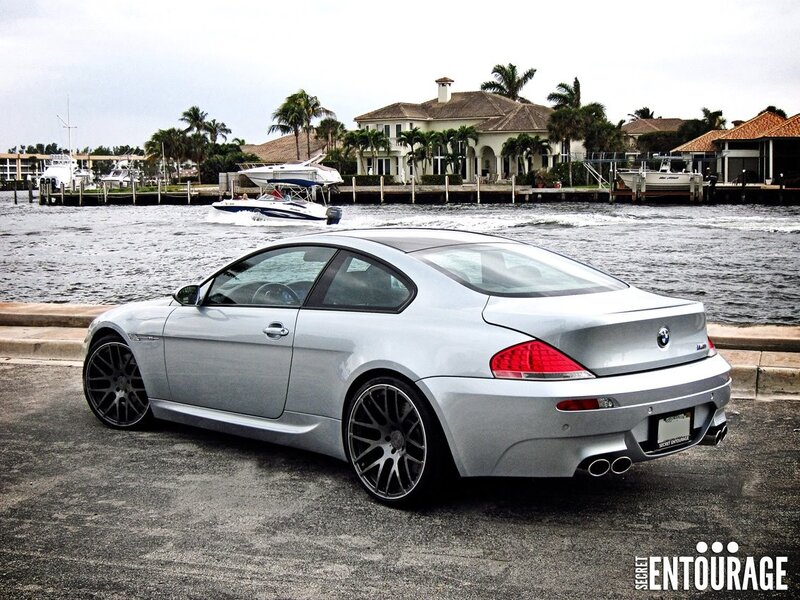 Silver BMW M6 by the water