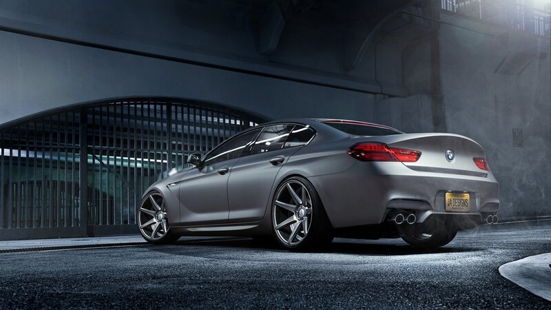 silver bmw m6 in garage