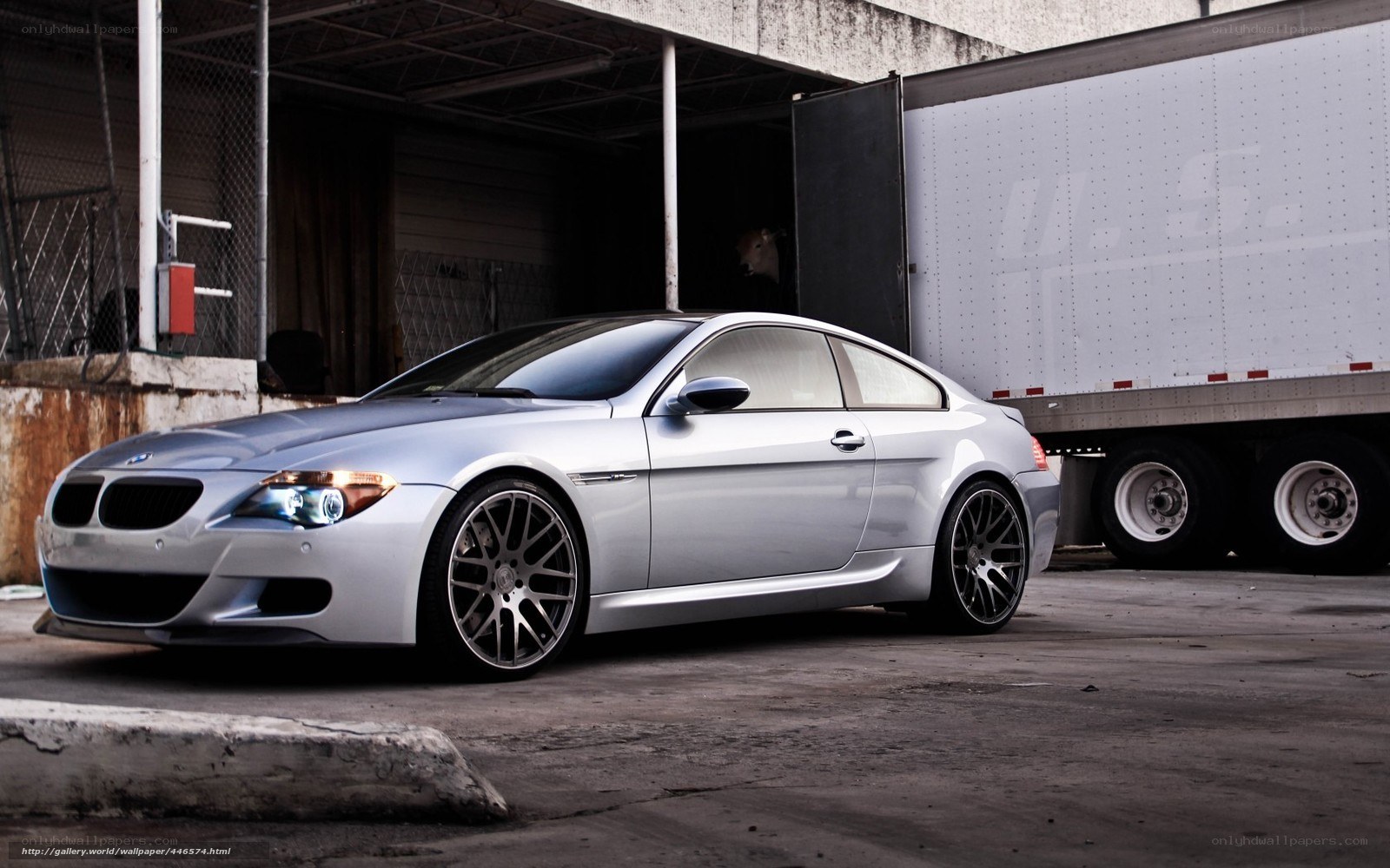 silver bmw m6 parked outside