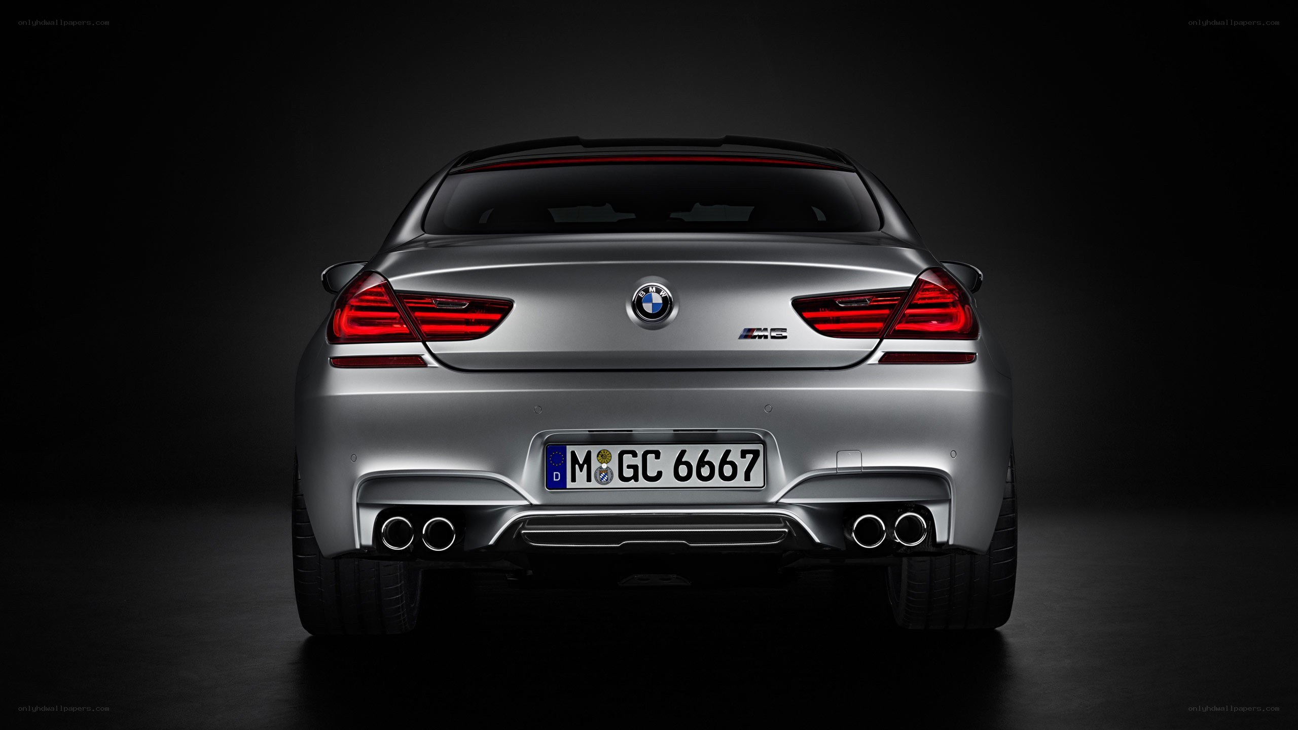 silver bmw m6 rear view