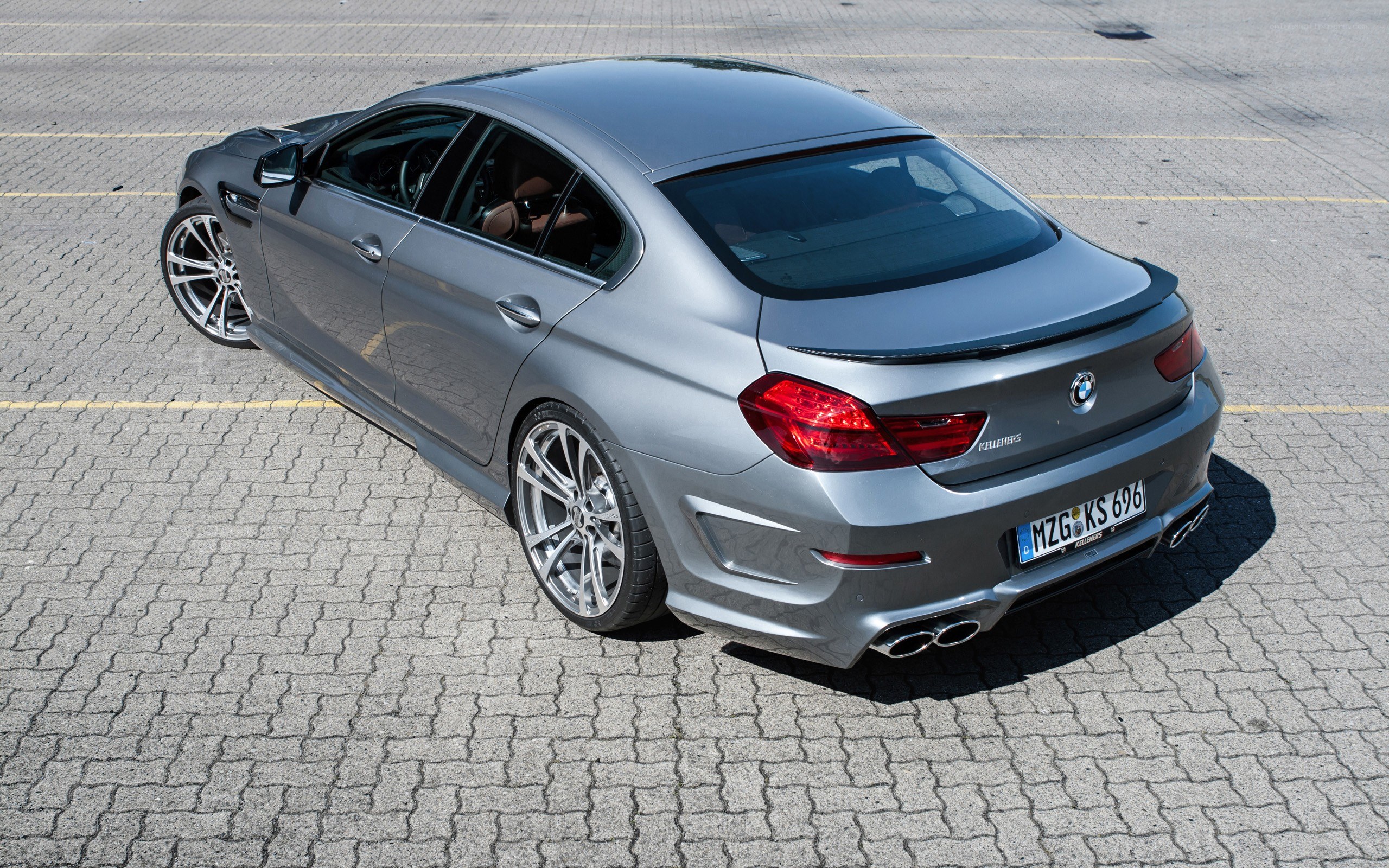 silver bmw m6 sedan