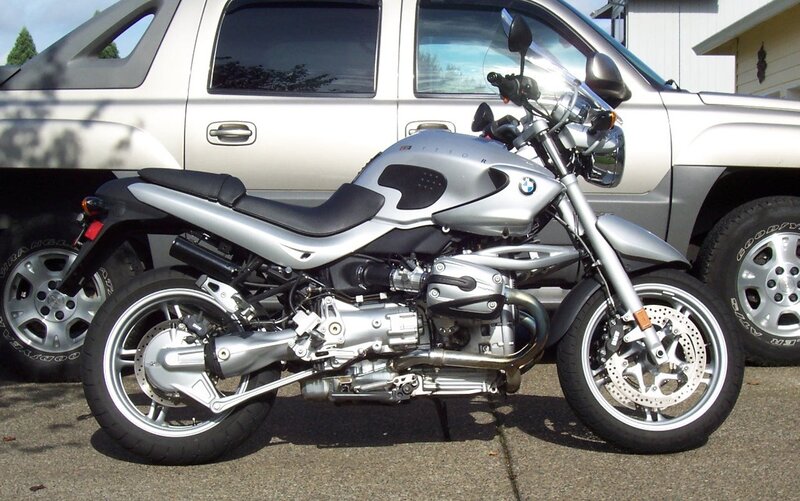 silver BMW motorcycle parked