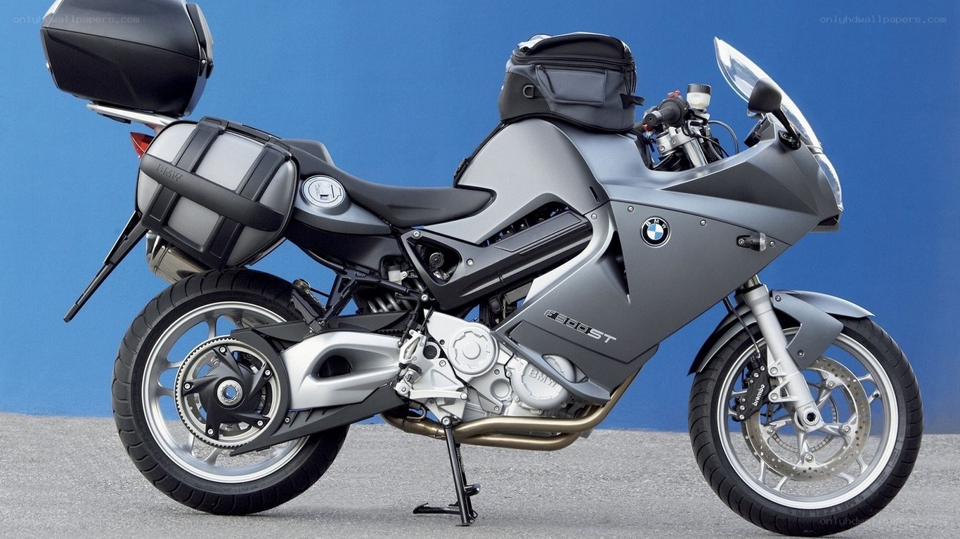 silver bmw motorcycle with luggage