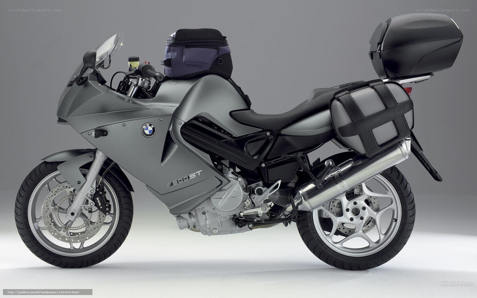 silver bmw motorcycle with luggage
