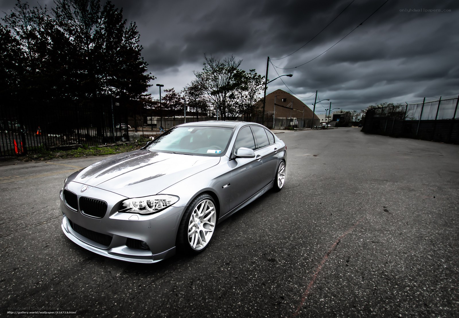 Silver BMW on a cloudy day