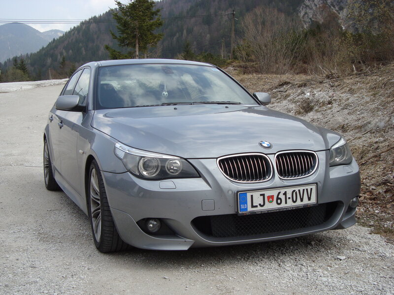 Silver BMW on a mountain road