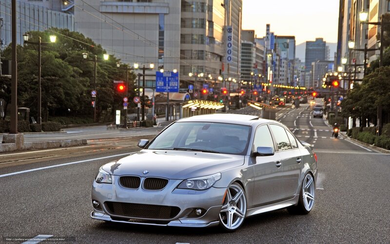 silver bmw on city street
