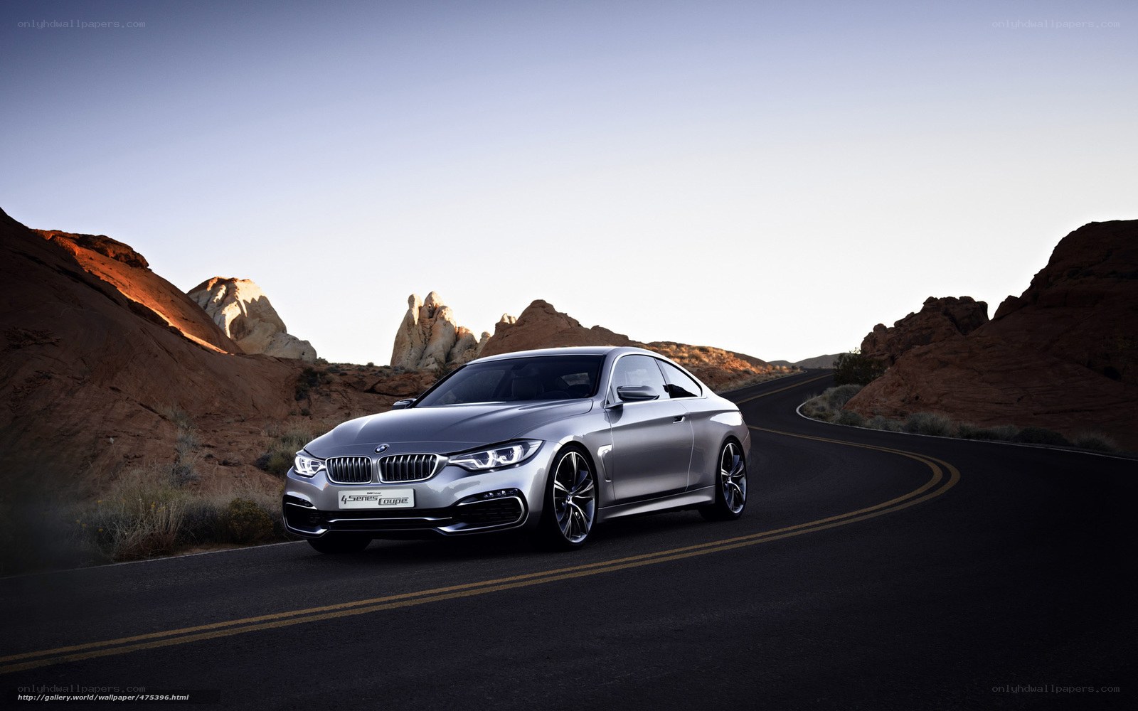 Silver BMW on desert road
