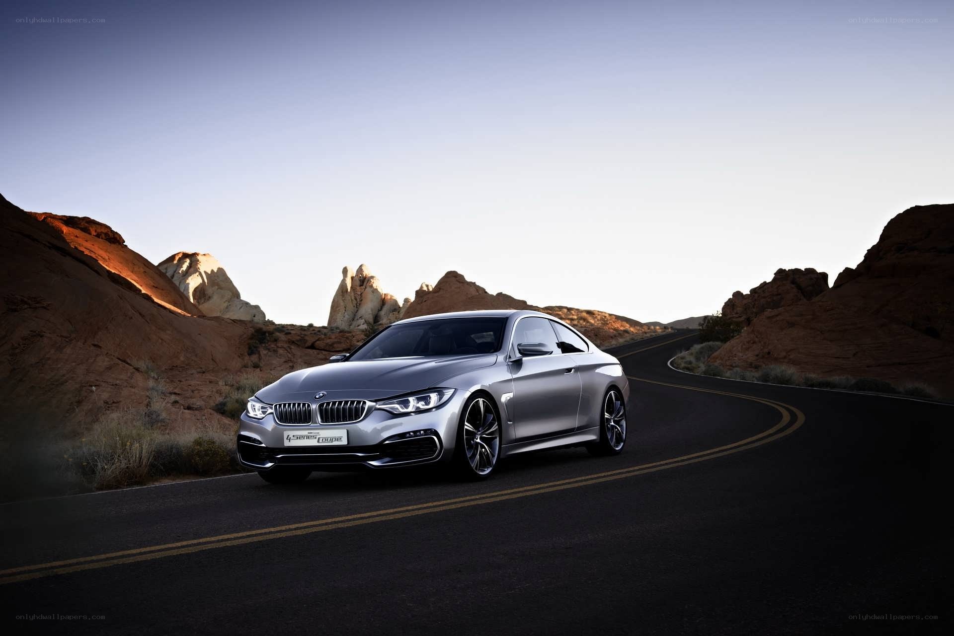 Silver BMW on desert road