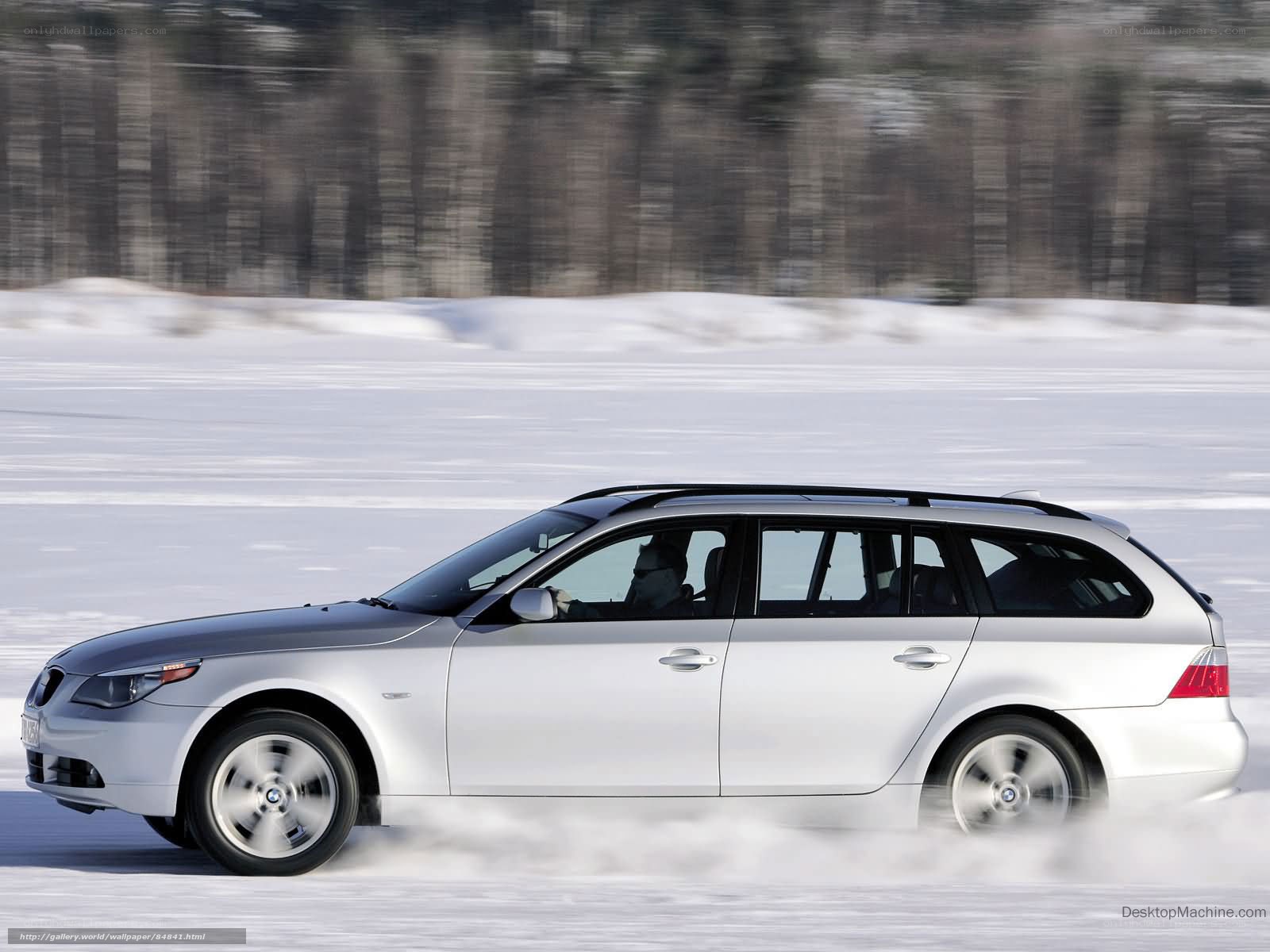 silver bmw on snowy road