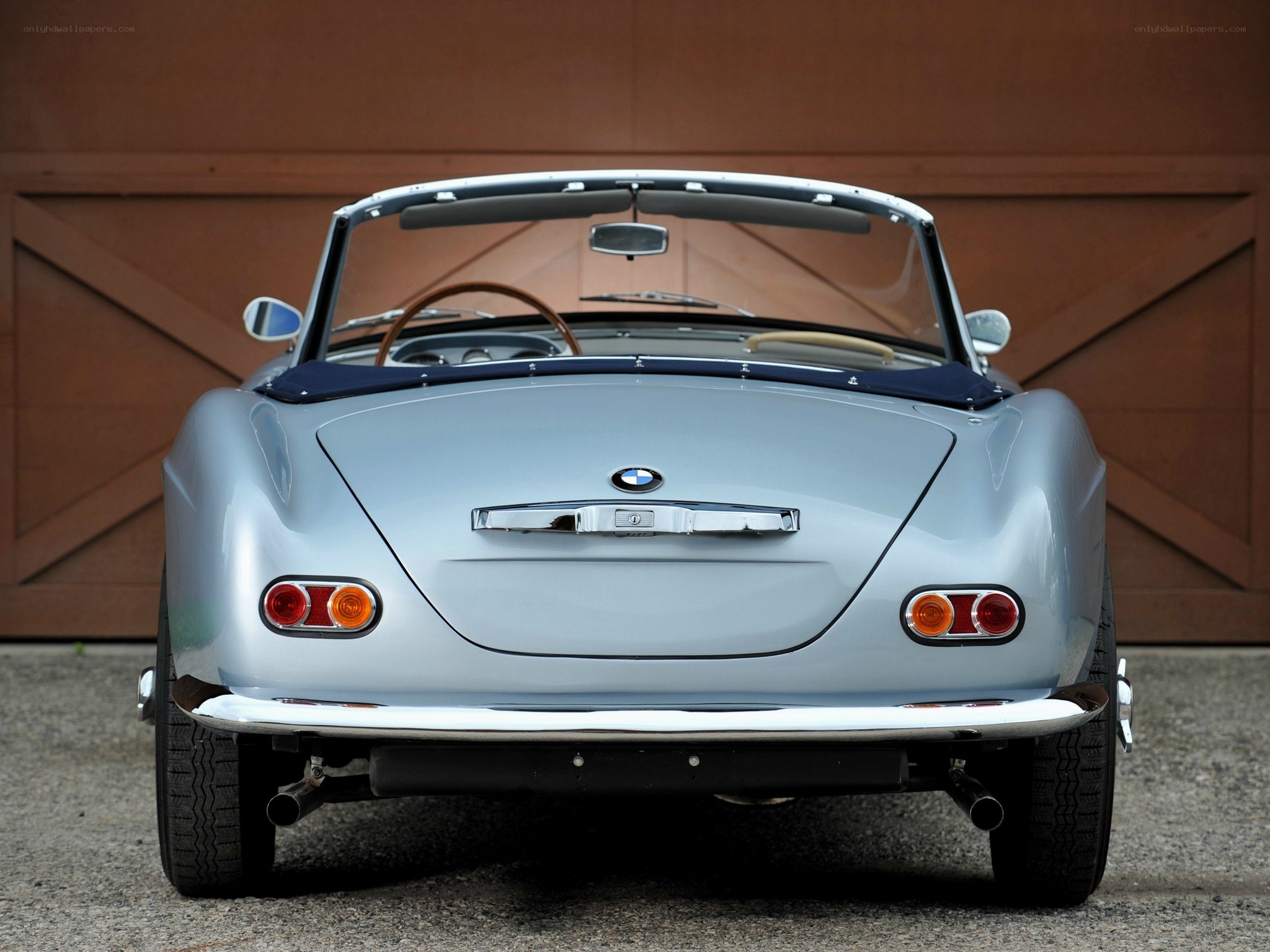silver bmw roadster rear view