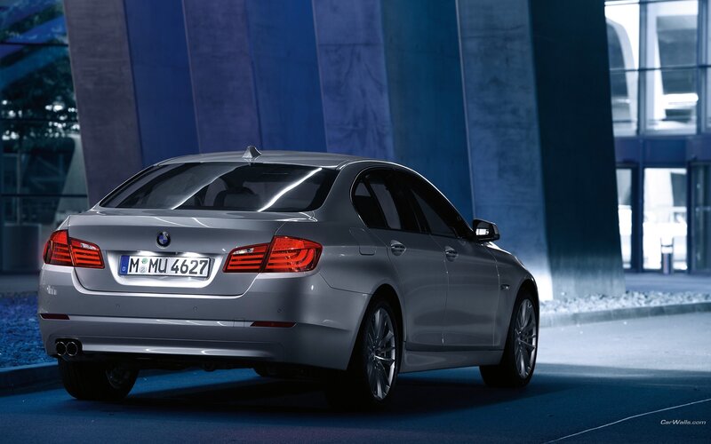 silver bmw sedan at night
