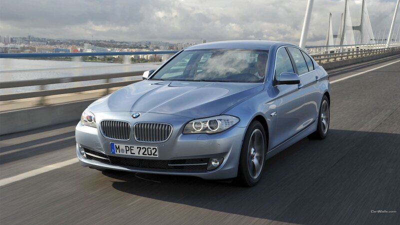 Silver BMW Sedan — Dynamic, Afternoon, Photograph, Bridge