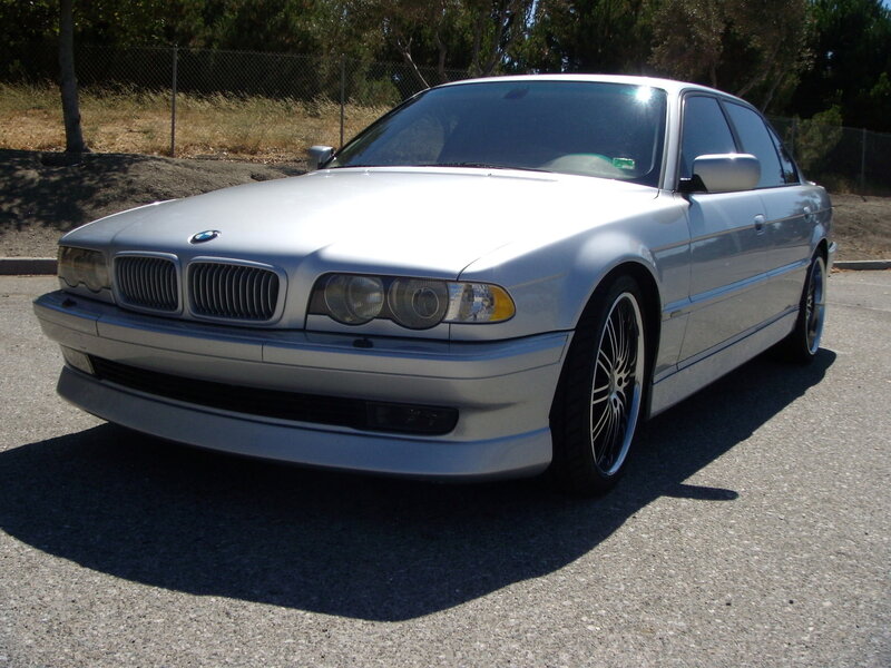 silver bmw sedan parked