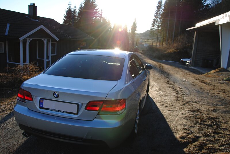 Silver BMW Sedan — Serene, Sunset