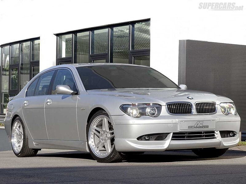 silver bmw sedan with schnitzer body kit