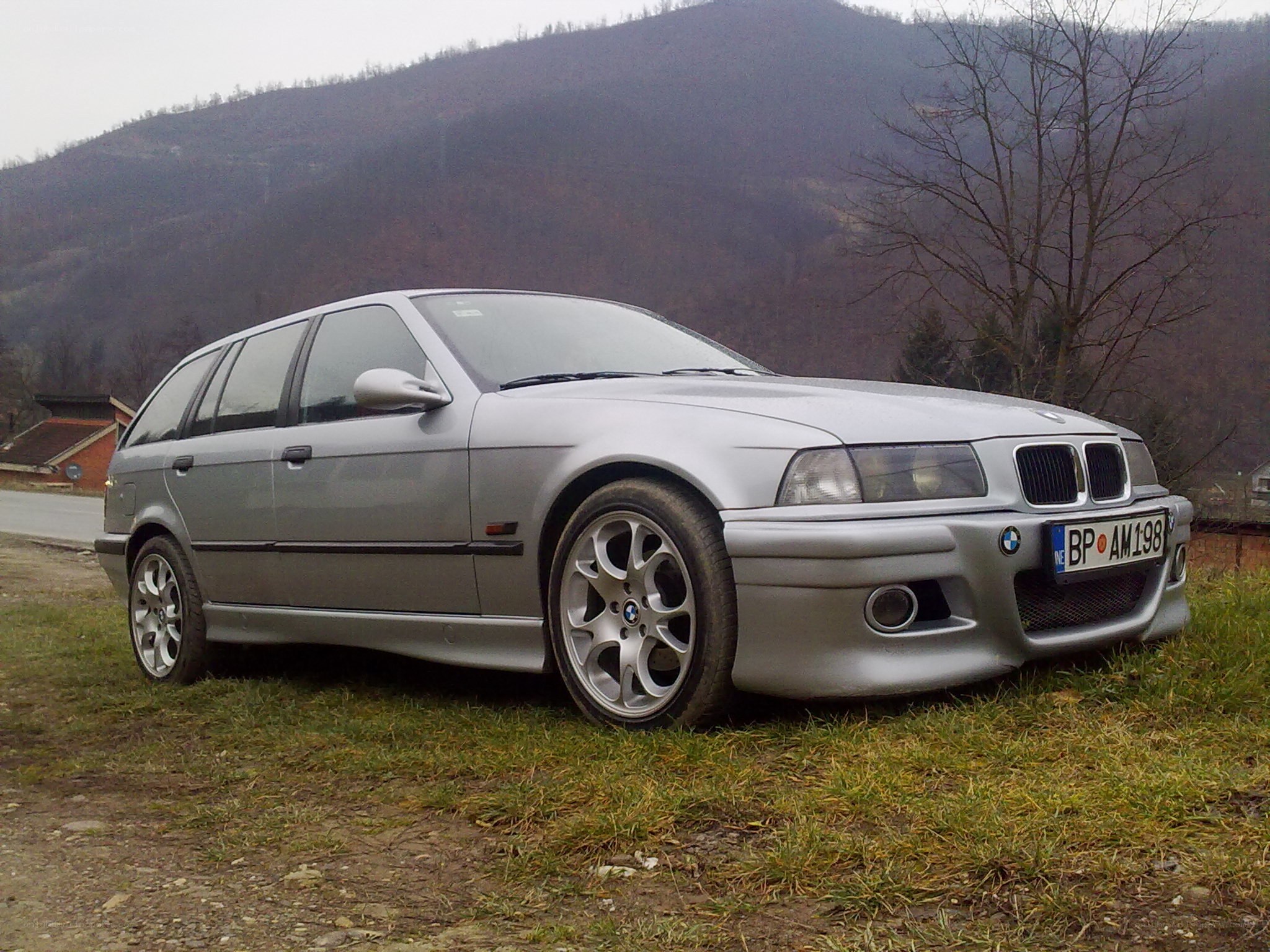 silver bmw station wagon